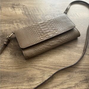 Dooney & Bourke Brown Clutch with Luxurious Textured Design